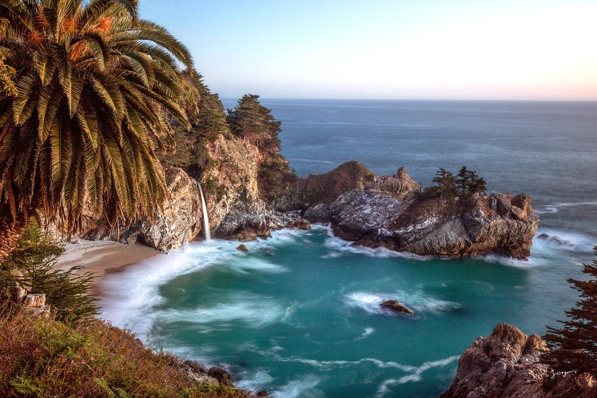mcway falls in big sur california during sunset