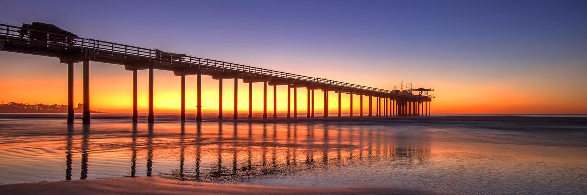 san diego scripps pier during a sunset overlooking the ocean
