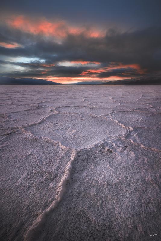 salt rings in death valley california sunset clouds